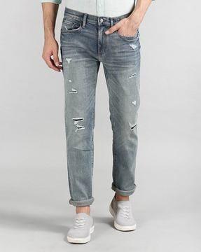 washed distressed slim fit jeans