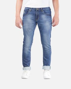 washed jeans with mid rise waist