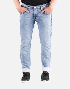 washed jeans with mid rise waist