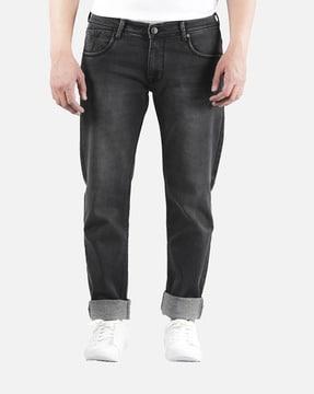 washed jeans with mid rise waist