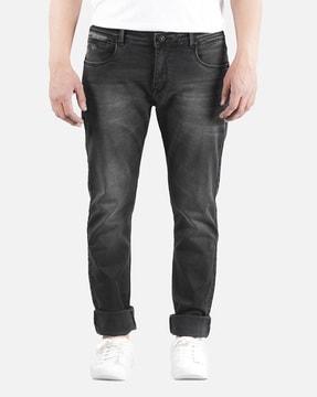 washed jeans with mid rise waist