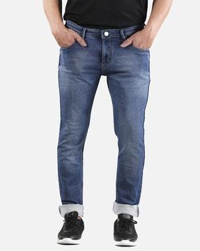 washed jeans with mid rise waist