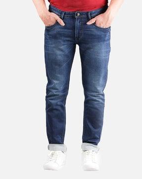 washed jeans with mid rise waist