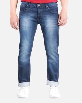 washed jeans with mid rise waist