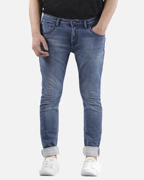 washed jeans with mid rise waist