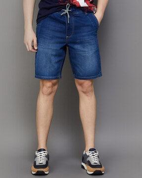 washed shorts with insert pockets