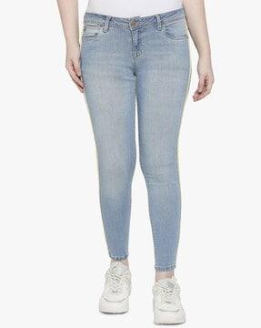 washed skinny jeans with contrast taping