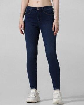 washed skinny jeans with insert pockets