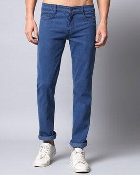 washed slim fit jeans with button closure