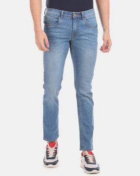 washed slim fit jeans with whiskers