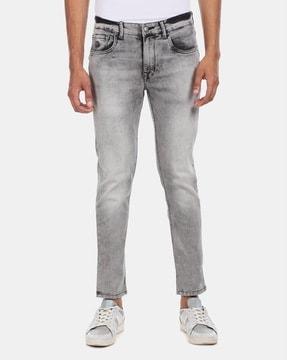 washed slim fit tapered jeans