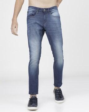 washed tapered fit jeans