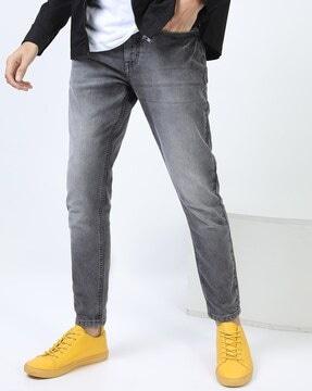 washed tapered fit jeans