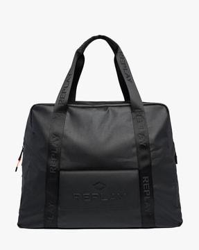 waxed denim duffle bag with embossed branding