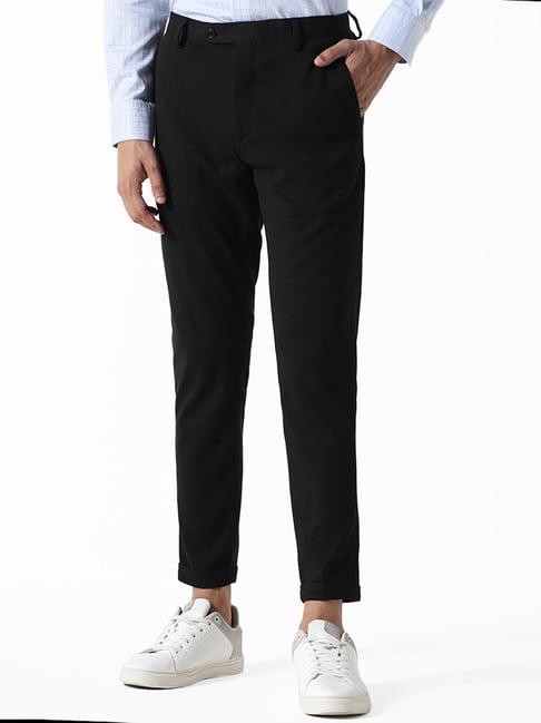 wes formals by westside solid black carrot fit trousers