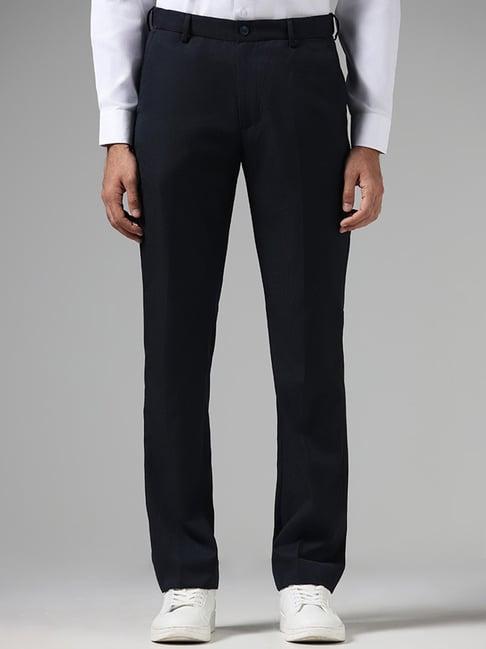 wes formals by westside solid navy relaxed fit trousers