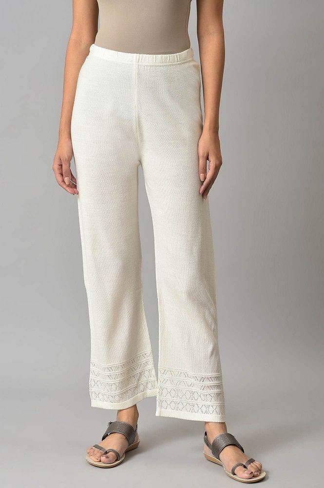 white acrylic knitted palazzo pants