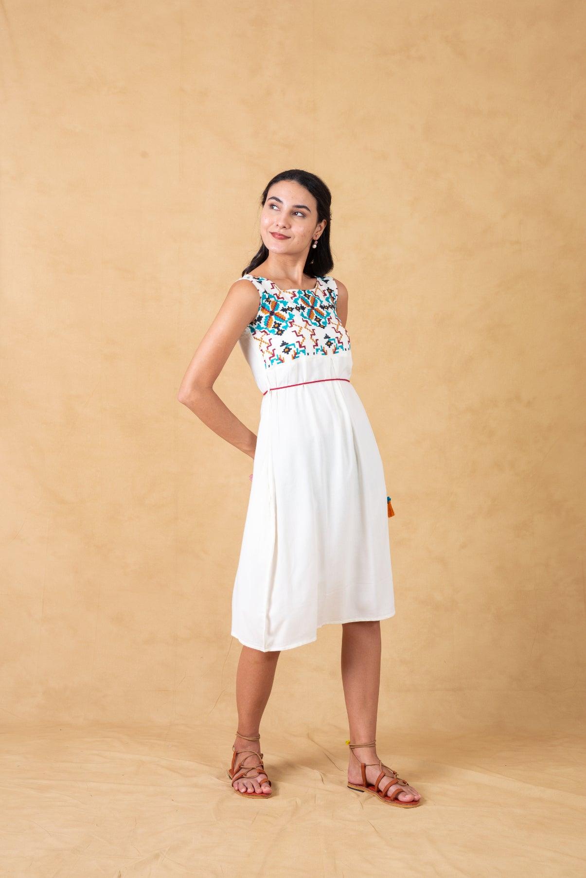 white-embroidered-dress-with-tie-ups