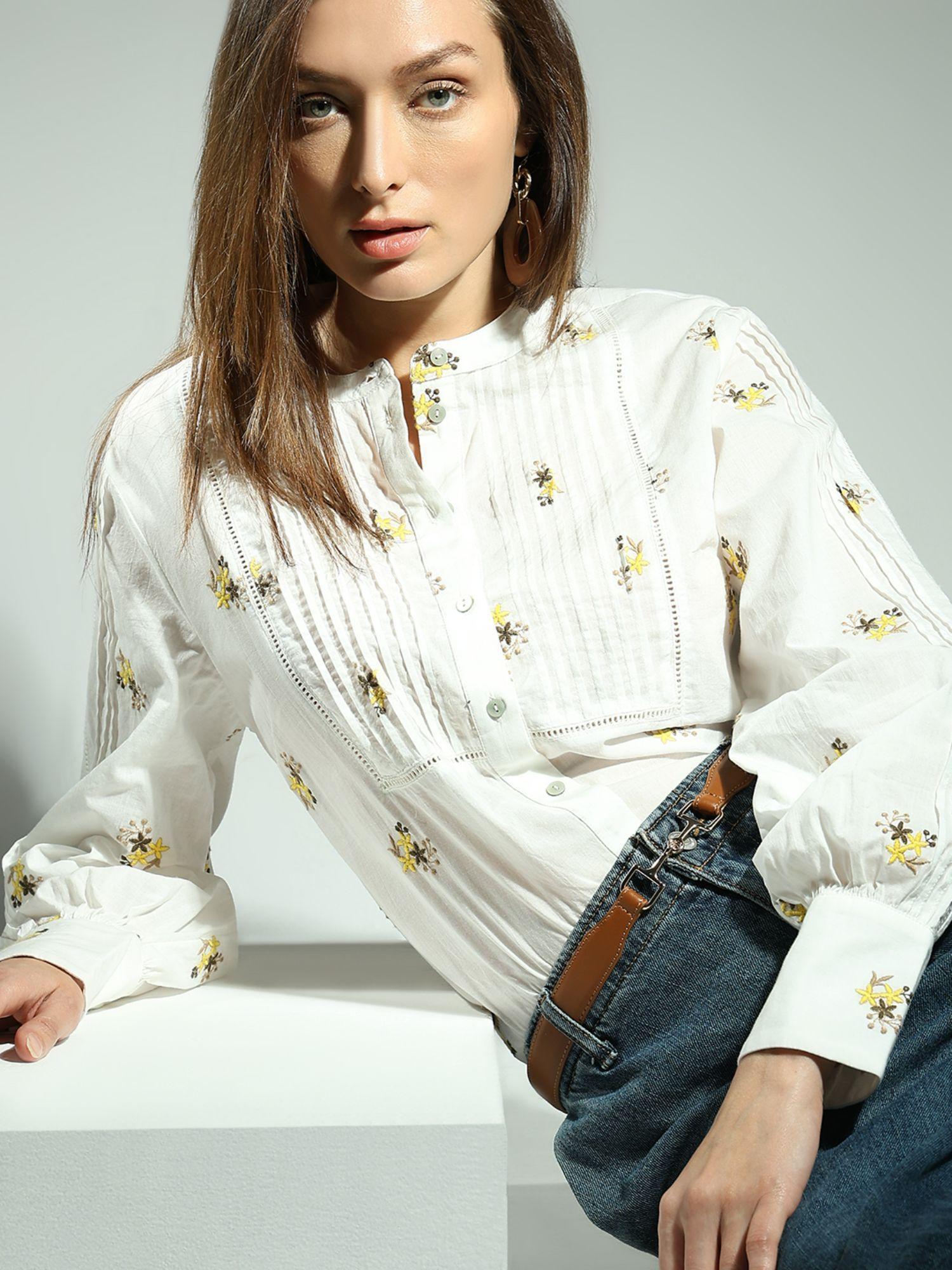 white embroidered shirt