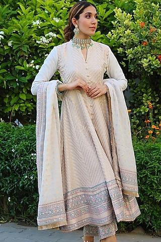 white anarkali set with woven motifs