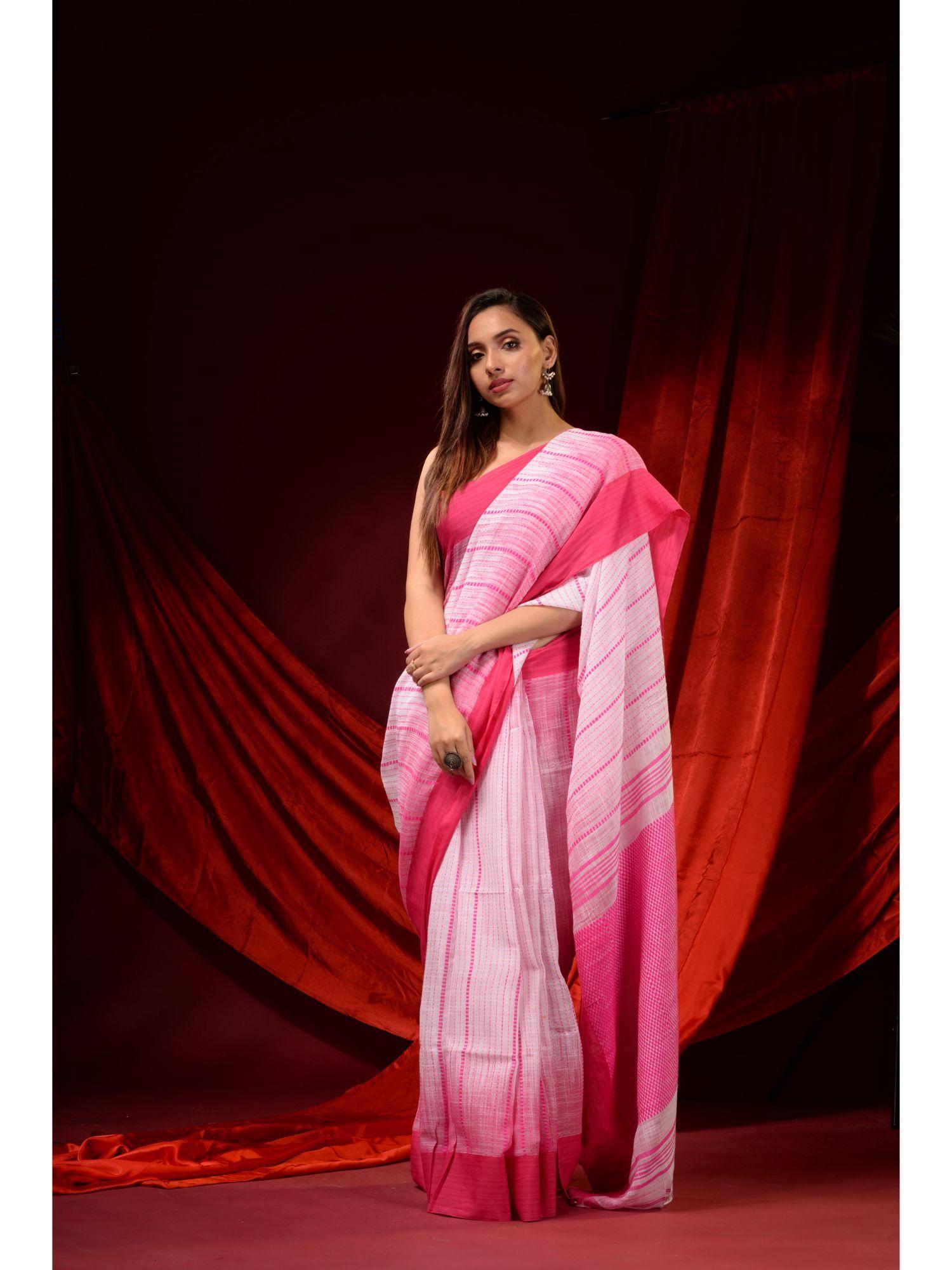 white and flamingo pink cotton handspun woven patterns saree with unstitched blouse