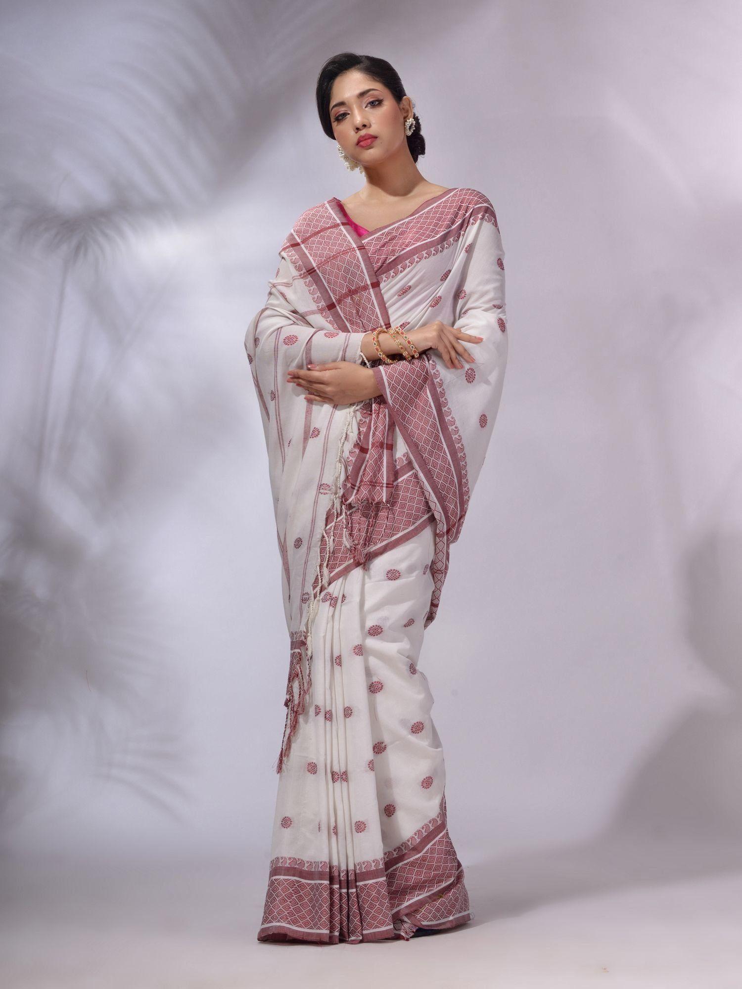 white cotton handwoven saree with unstitched blouse and texture and paisley borders