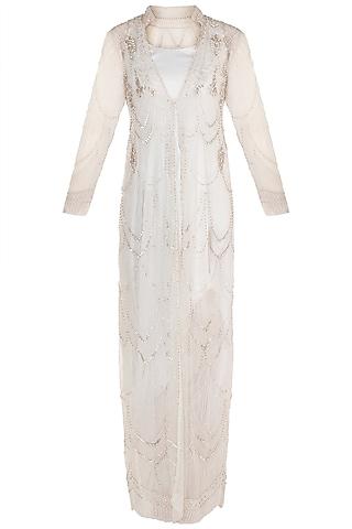 white cowl gown with embroidered jacket
