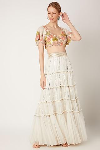 white embroidered blouse with tiered skirt