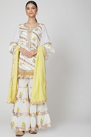 white embroidered gharara set with yellow dupatta