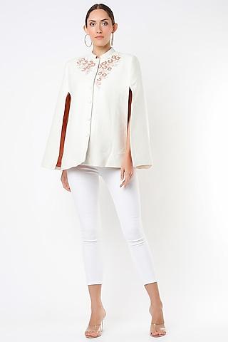 white embroidered handwoven cape