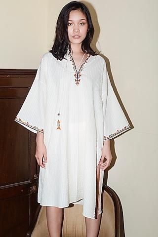 white embroidered handwoven cotton tunic with tassels