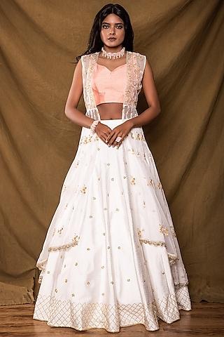 white embroidered jacket lehenga set