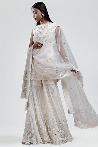 white embroidered kurta set
