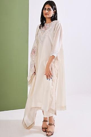 white embroidered kurta set