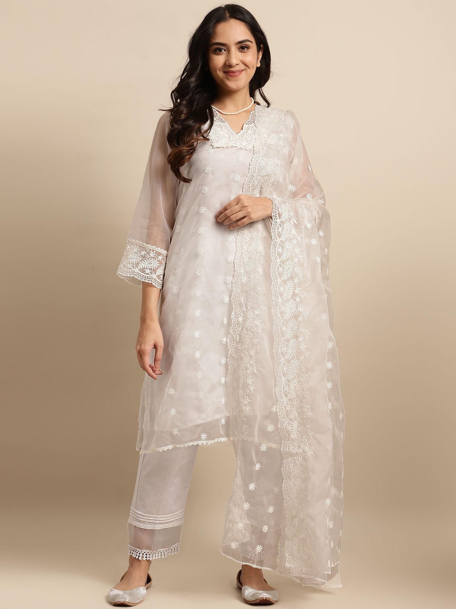 white embroidered organza kurta paired with matching pant and heavy chikankari dupatta