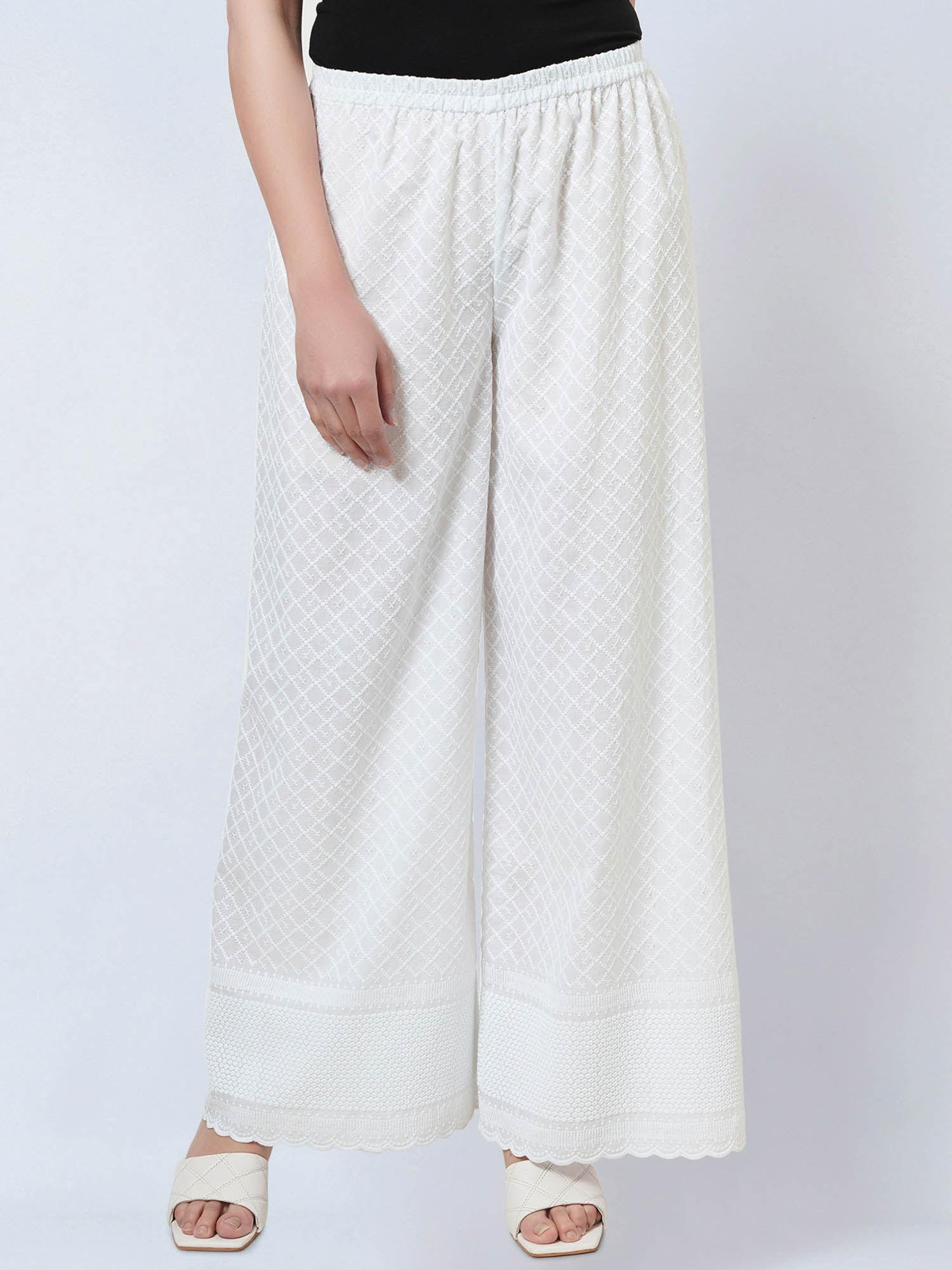 white embroidered pants
