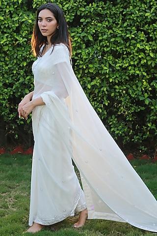 white embroidered saree set