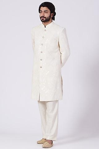 white embroidered sherwani