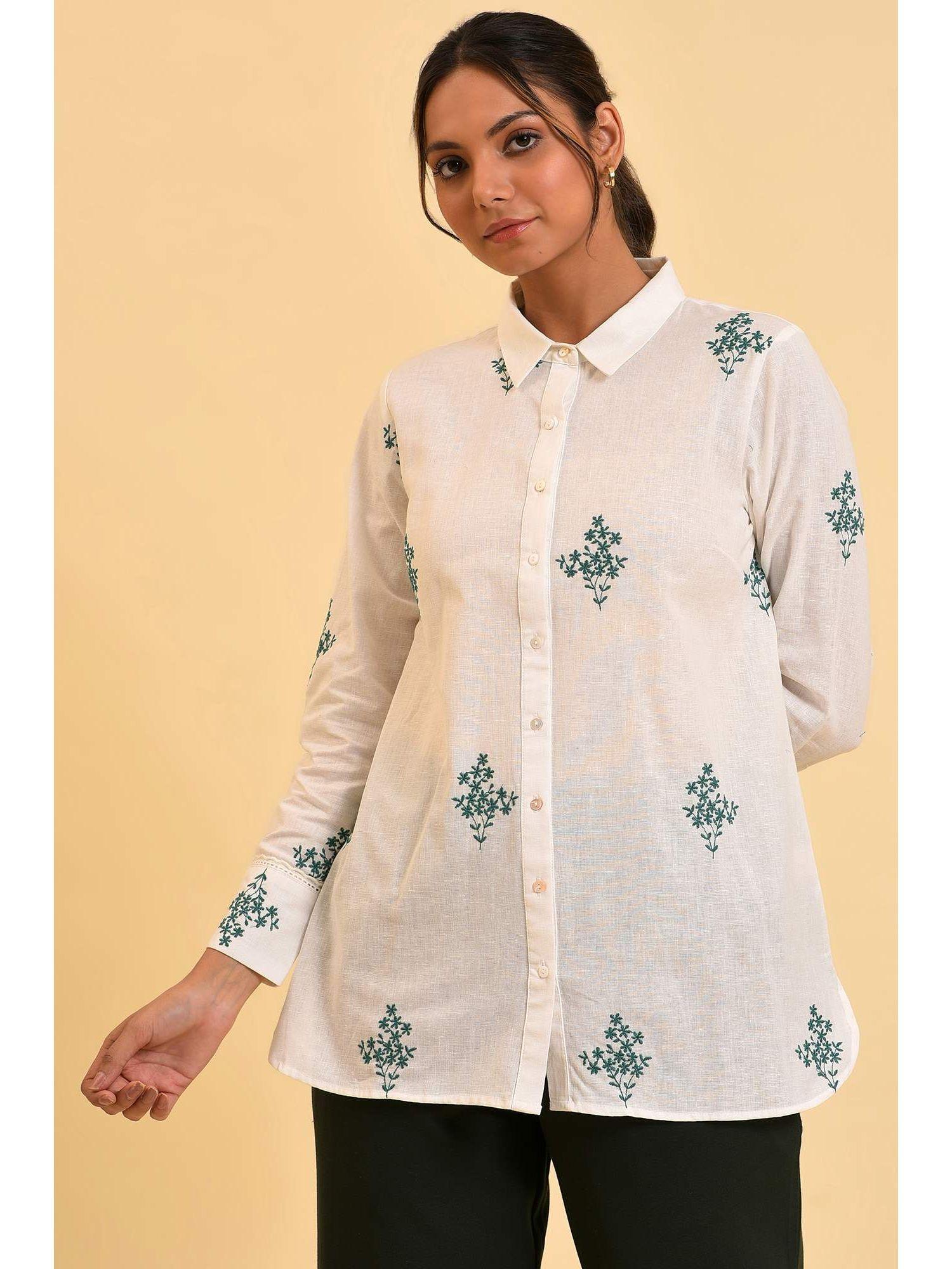 white embroidered shirt