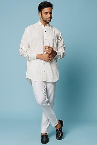 white embroidered shirt