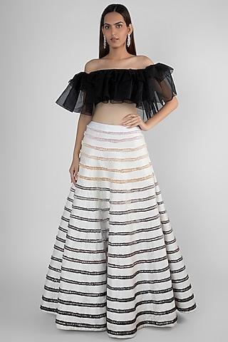 white embroidered skirt with off shoulder ruffled top
