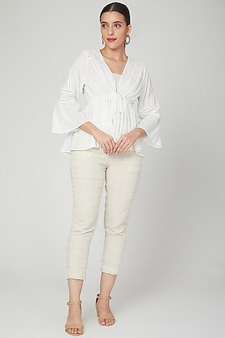 white frilled top with tie-up for girls