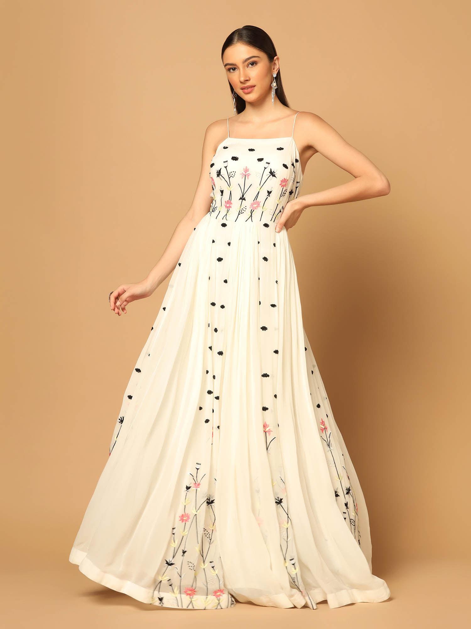 white gown with floral embroidery