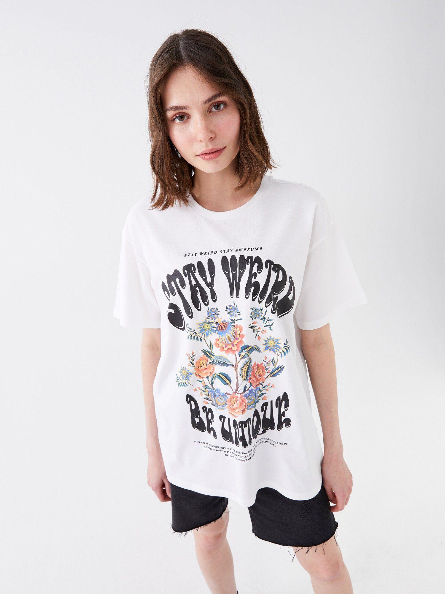 white graphic stay weird t-shirt