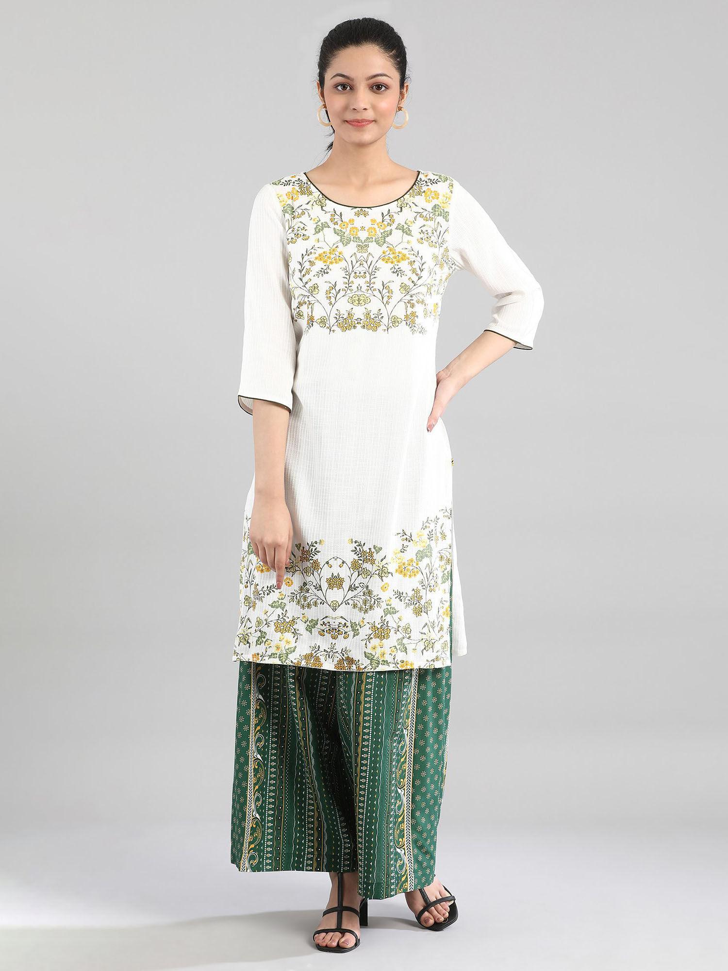 white kurta with print on yoke and hem