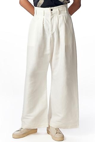 white linen high-waisted trousers