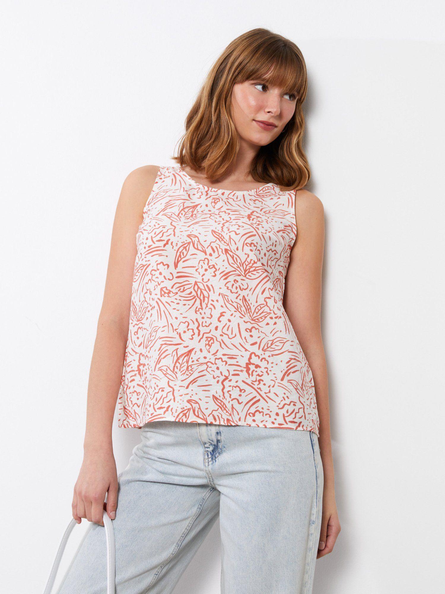 white orange all over printed sleeveless top