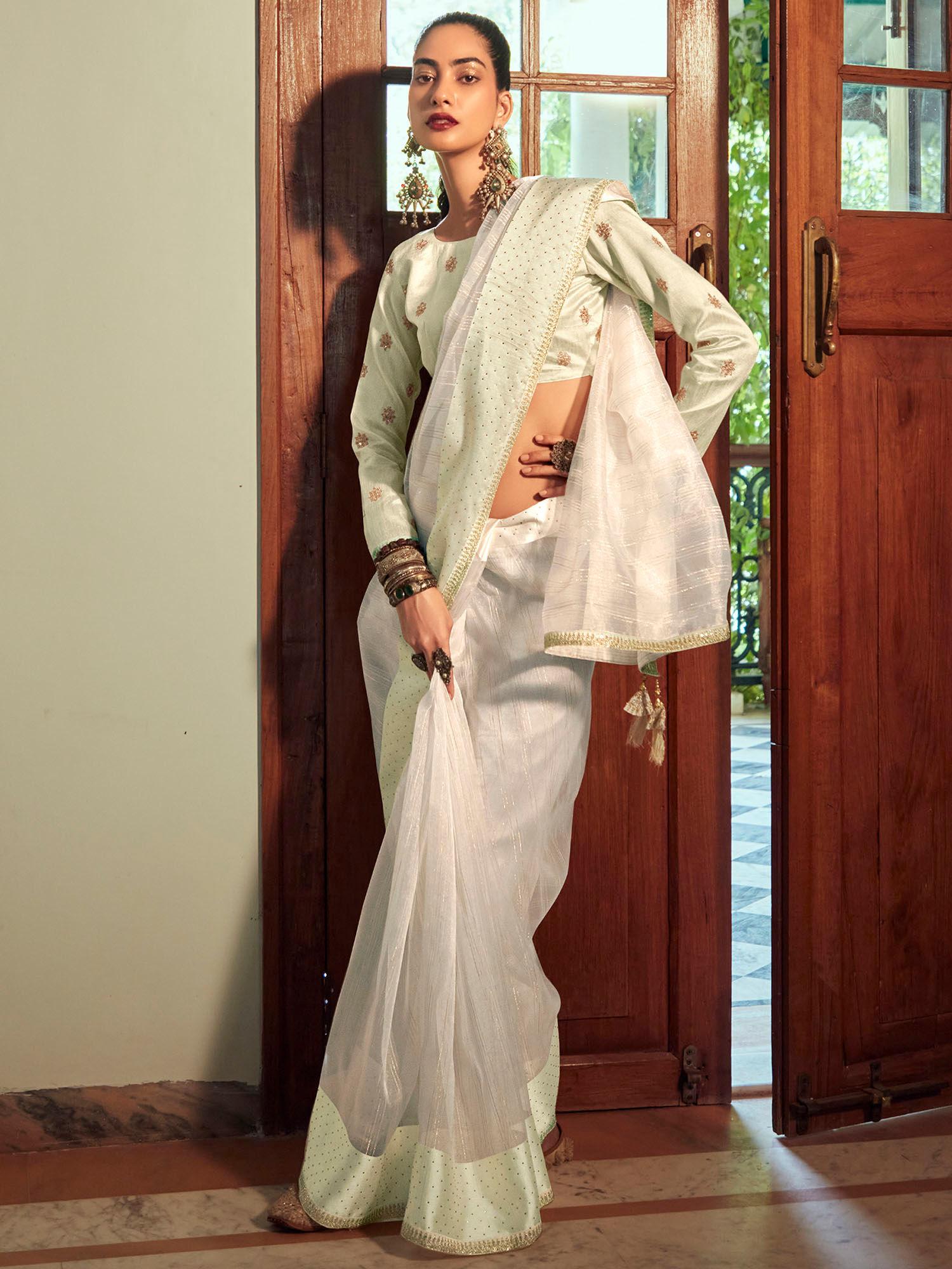 white organza woven saree with unstitched blouse