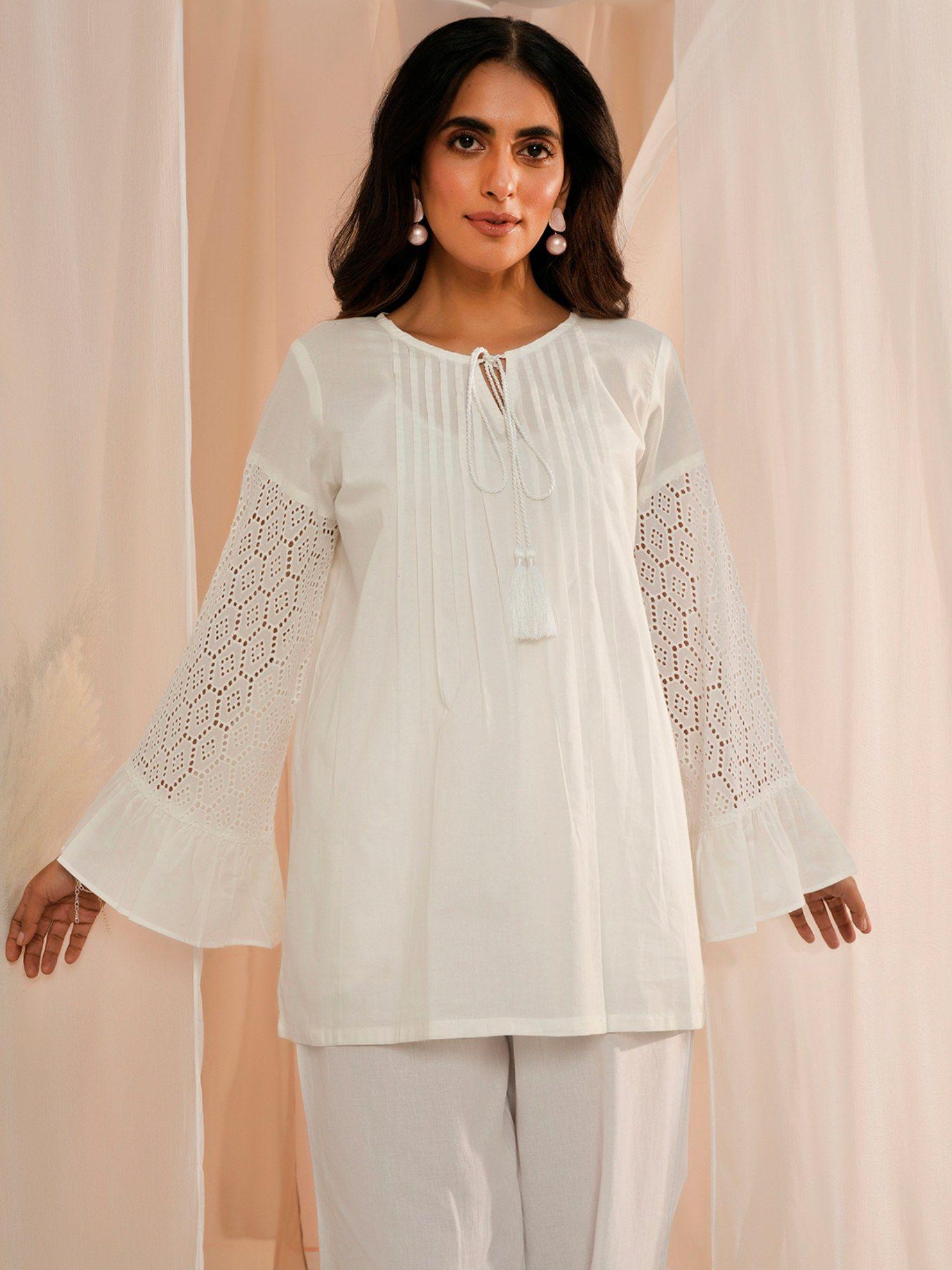 white pleated kurti with tassels with schiffli work