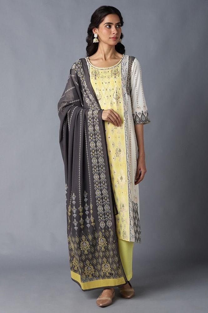 white printed kurta, yellow palazzo and dupatta set